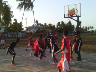 Part of the semi-final action between Fyrish Black Sharks (black) and New Amsterdam Warriors in the Berbice Amateur Basketball Association (BABA) sanctioned Anamayah Memorial Championships. 