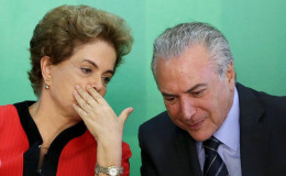 Brazil’s President Dilma Rousseff (L) talks to Vice President Michel Temer at the Planalto Palace in Brasilia, Brazil, in this March 2, 2016 file photo. REUTERS/Adriano Machado/Files