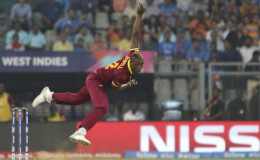West Indies Andre Russell bowls. REUTERS/Shailesh Andrade
