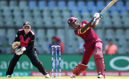 Britney Cooper of the West Indies hits out with Rachel Priest of New Zealand looking on during the Women’s ICC World Twenty20 India 2016 Semi Final match between New Zealand and West Indies at Wankhede Stadium. (Photo by Jan Kruger-IDI/IDI via Getty Images)