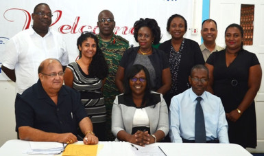 GPHC Board Chairman Dr Carl Max Hanoman (seated, left) and Minister within the Ministry of Public Health Dr Karen Cummings (seated, centre) pose with the members of the new hospital board (GINA photo) 