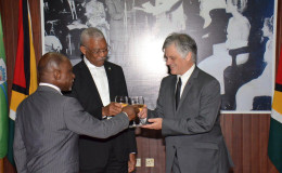 President David Granger (centre), today, accredited John Pilbeam (right) as the new non-resident High Commissioner of the Commonwealth of Australia to Guyana. The new High Commissioner is based in Trinidad and Tobago. At left is Foreign Affairs Minister Carl Greenidge. (Ministry of the Presidency photo)