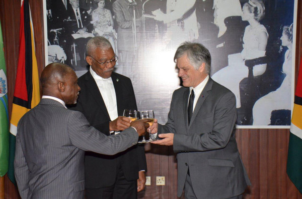 President David Granger (centre), today, accredited John Pilbeam (right) as the new non-resident High Commissioner of the Commonwealth of Australia to Guyana. The new High Commissioner is based in Trinidad and Tobago. At left is Foreign Affairs Minister Carl Greenidge. (Ministry of the Presidency photo)