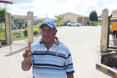 A voter at the Diamond Secondary School.