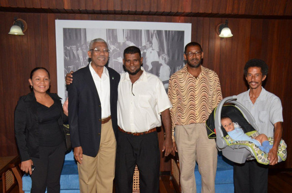 From left: Susan Lowe, President David Granger, Wazeer Latiff, Surendra Sookdeo and Michael Lowe. 