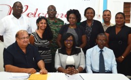 Minister in the Ministry of Public Health, Dr Karen Cummings (seated at centre) with the new board. Dr Max Hanoman is seated at left. (GINA photo)
