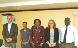 Minister within the Ministry of Public Infrastructure, Annette Ferguson (centre) with (left to right) Arran De Moubray, Technical Project Coordinator, CARIBSAVE; Judi Clarke, Caribbean Regional Director, CARIBSAVE; Sophie Makonnen, IDB Representative; and Horace Williams, CEO of the Hinterland Electrification Company Inc. (GINA photo)
