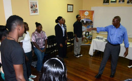 Paul Waldron (right) during the training session for tour guides at the Ministry of Education, Department of Culture, Youth and Sport  (GINA photo)