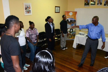 Paul Waldron (right) during the training session for tour guides at the Ministry of Education, Department of Culture, Youth and Sport  (GINA photo)