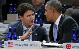 Canada’s Prime Minister Justin Trudeau (L) speaks with U.S. President Barack Obama after the start of the second and final plenary session of the Nuclear Security Summit in Washington April 1, 2016. REUTERS/Jonathan Ernst