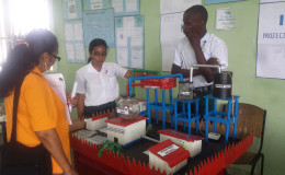 Students of Anna Regina Secondary School explaining their Styrofoam to environmentally friendly plastic plant at the National Science, Mathematics and Technology Fair and the final leg of the Sagicor Visionaries Challenge 2016 at Linden last week. Bygeval Secondary won for its natural mosquito repellent, which students created using the flower of the Artocarpus Camasi plant (commonly known as bread nut or Katahar) and coconut oil.