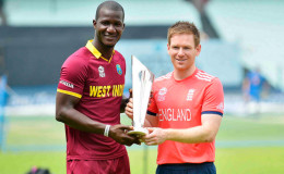 West Indies skipper Darren Sammy, left and England skipper Eion Morgan would like to get sole possession of the ICC T20 World Cup trophy. (photo courtesy WICB website)