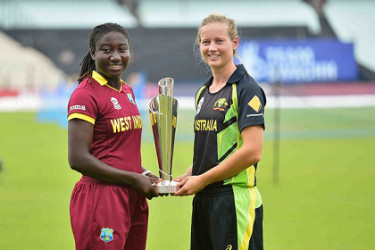 West Indies Women’s captain Stafanie Taylor (left) and Australia Women’s captain Meg Lanning pose with the Twenty20 World Cup trophy. (Photo courtesy WICB Media)  