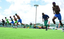 The Guyana Jaguars players going through the yo-yo test yesterday at Bourda.