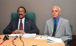 Minister of Communities Ronald Bulkan (right) and Attorney General and Minister of Legal Affairs Basil Williams at the press conference  (GINA photo)