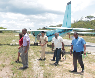 Minister of Social Protection Volda Lawrence being escorted on arrival in Bartica by the new town’s Mayor Gifford Marshall (Ministry of Social Protection photo) 