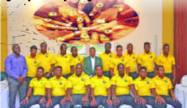 The Guyana Jaguars team pose with GCB Secretary Anand Sanasie (center) and James Bond NSC representative. (Orlando Charles photo) 