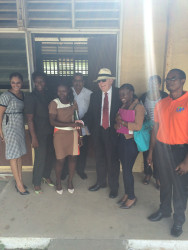 High Commissioner Pierre Giroux (with hat) with the Fort Ordnance Primary School Head Teacher, CDC Director General, Colonel Chabilall Ramsarup (Ret’d), and parents of some of the students (Canadian High Commission photo) 