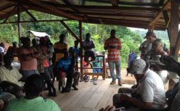  Minister Simona Broomes (backing camera) engaging workers during one of her interior ‘clinics.’