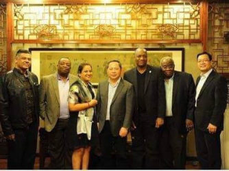 The photograph, which shows Tiwarie, APNU member Larry London, a representative of NICIL, Harmon and Williams in the company of two Chinese businessmen while on the China visit, yesterday began circulating on social media and was met with much criticism.  