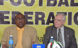 Canada’s High Commissioner to Guyana Pierre Giroux, right and Golden Jaguars coach Jamaal Shabazz.
