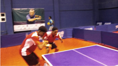 Guyana’s  18 years and under Junior Boys doubles pair of Kyle Edghill and and Elishaba Johnson in the boys doubles final at the  21st 2016 Caribbean Junior and Cadet Table Tennis Championships being held in the Dominican Republic. 