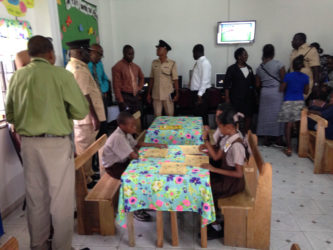 Students of La Parfaite Harmonie Primary School wasted no time in getting settled in their new library as parents and members of the Regional Office were given a tour of the room. 