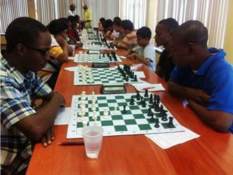 Action in the seven round ECI-sponsored Swiss-system chess tournament which took place at the National Resource Centre last weekend