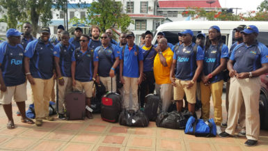 The Barbados national 15s rugby outfit pose for a photo before checking into the Sleep In Hotel yesterday afternoon. 