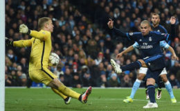 Manchester City’s goalkeeper Joe Hart makes a point blank save from Real Madrid’s Pepe.
