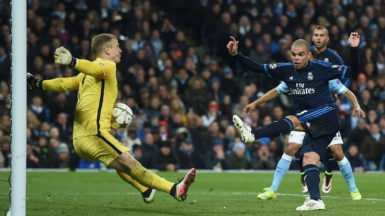 Manchester City’s goalkeeper Joe Hart makes a point blank save from Real Madrid’s Pepe. 