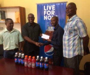 President of the GBA, Steve Ninvalle receives timely sponsorship from Larry Wills, Manager of the Pepsi brand yesterday ahead of the Caribbean’s first Schoolboys and juniors tournament is staged here tomorrow and Saturday at the Cliff Anderson Sport Hall.