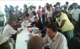 Staff of the housing department attending to Region Six residents’ concerns  (GINA photo)