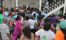 Supporters and others thronged City Hall today for a  glimpse of the new council which was sworn in. (Keno George photo)