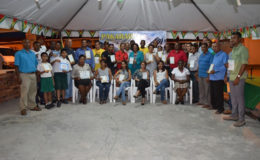 Participants of the 14th Pakaraima Mountain Safari with their certificates along with Minister of Telecommunication Catherine Hughes, Minister within the Ministry of Indigenous Peoples’ Affairs, Valerie Garrido-Lowe (centre) and Director of the Guyana Tourism Authority, Indranauth Haralsingh (7th from left standing) (GINA photo)