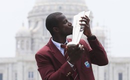 Darren Sammy savours the moment with the West Indies trophy (Windies Cricket photo)