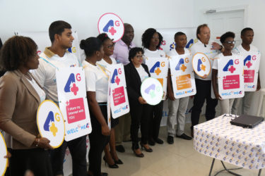 GTT CEO Justin Nedd (fifth, left) and Chief Commercial Officer Gert Post (third, right) along with company representatives at the launch of GTT’s 4G service yesterday. (Keno George photo)