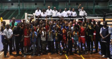The boxers along with their trainers and officials of the Caribbean’s Schoolboys and Juniors tournament pose for a photo opportunity after the two-night tournament concluded at the Cliff Anderson Sports Hall on Saturday night. 