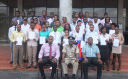 The thirty-seven ranks posed with Crime Chief Wendell Blanhum (sitting in front row, at left), Force Training officer Paul Williams and Course Coordinator Brian Eastman at the conclusion of the closing ceremony on Friday.