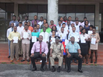 The thirty-seven ranks posed with Crime Chief Wendell Blanhum (sitting in front row, at left), Force Training officer Paul Williams and Course Coordinator Brian Eastman at the conclusion of the closing ceremony on Friday.