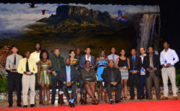 Last night’s awardees pose for a photo opportunity with Director of Sports, Chris Jones and Minister within the Ministry of Education, Department of Culture and Sport, Nicolette Henry at the conclusion of the National Sports Commission annual award ceremony. (Orlando Charles photo)
