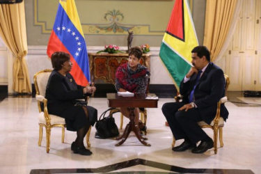 Guyana’s Ambassador to Venezuela Cheryl Miles (left) speaks with Venezuelan President Nicolás Maduro at her accreditation ceremony at the Miraflores Palace in Caracas.