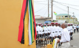 President David Granger about to lay a wreath yesterday at the restored cenotaph in the centre of Bartica, which was officially declared a town. (Photo by Keno George)