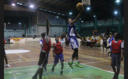 Jether Harris of Marian Academy in the process of scoring a layup during his team’s hard fought loss to President’s College in the u-14 section of the National School Basketball Festival (NSBF) Georgetown & East Coast Regionals. 