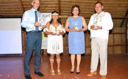 (From left) Minister of Business, Dominic Gaskin; a young woman who is featured in the advertising campaign of the Luxury Facial Cleanser; Minister within the Ministry of Indigenous People’s Affairs, Valerie Garrido-Lowe and Vice President and Minister of Indigenous People’s Affairs, Sydney Allicock display a few bottles of the cleanser and the soap.  (Ministry of the Presidency photo)