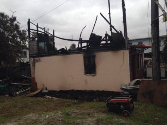  A side view of the house after the fire.