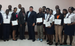 Mexican Ambassador to Guyana, Ivan Sierra (centre) with the students