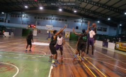 Jaleel Duke of President’s College attempting a jump shot against St. Rose’s High during their matchup of the National Schools Basketball Festival (NSBF) Georgetown and East Coast Regionals at the Cliff Anderson Sports Hall.
  
