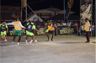 Action between Team Magics and Attackers in the Guinness of the Streets Linden edition at the Mackenzie Market Tarmac Friday. 