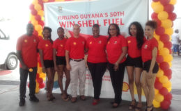 Sol Retail Sales Executive Renee Armstrong (fourth, right) poses with other Sol executives and models at yesterday’s launch.
